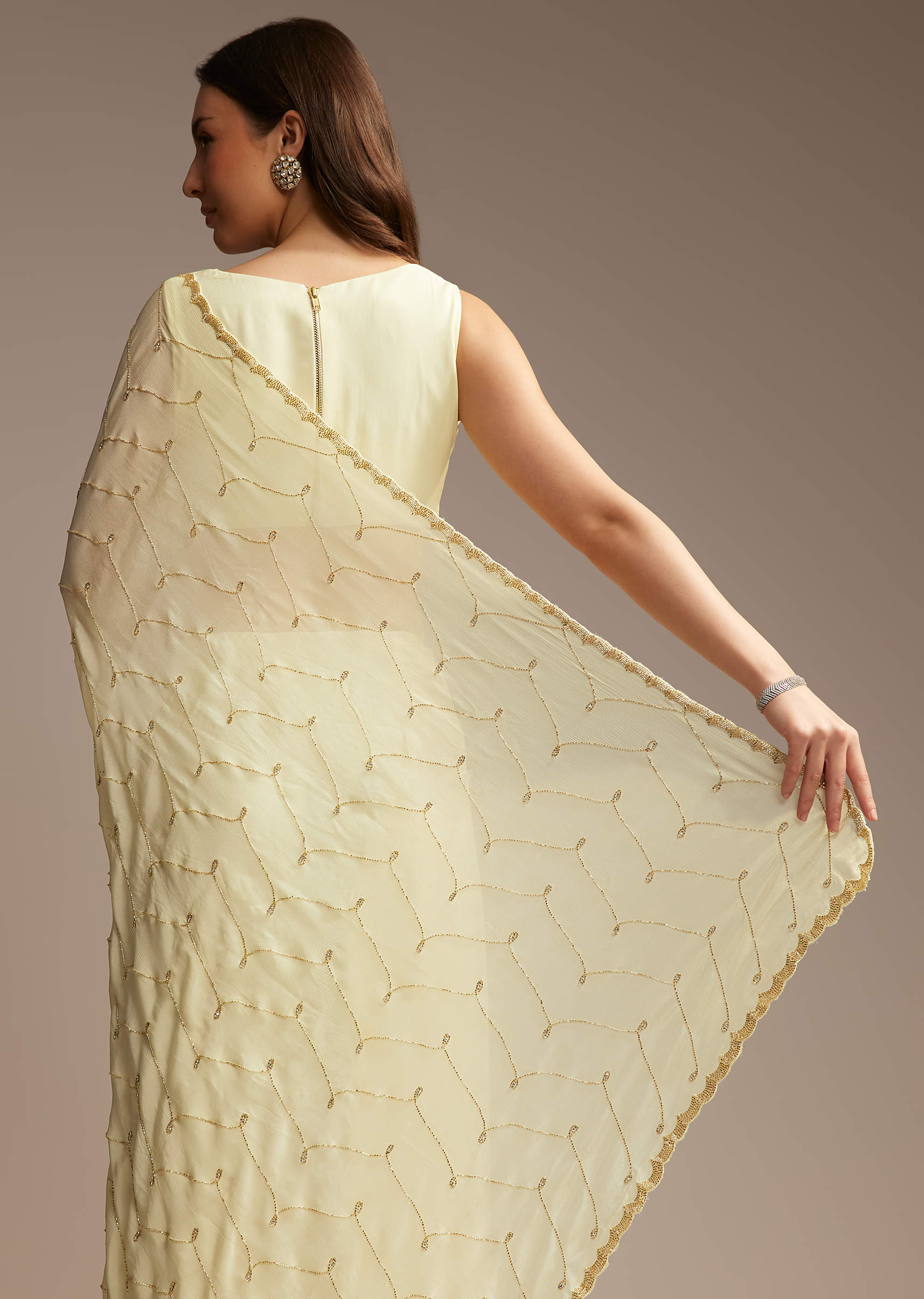 Off White Chinon Saree with Cutdana and Stone Work