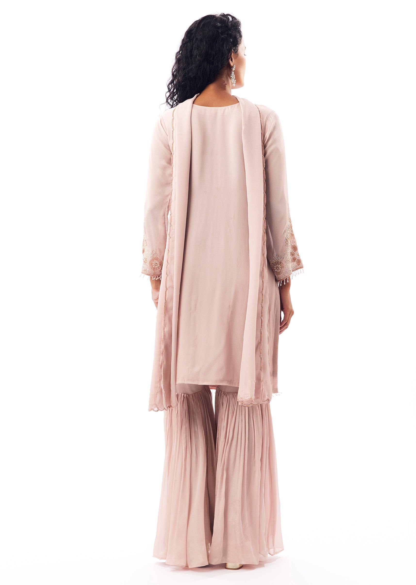 Peach Pakistani Style Sharara Suit With Cutdana Moti Shimmer