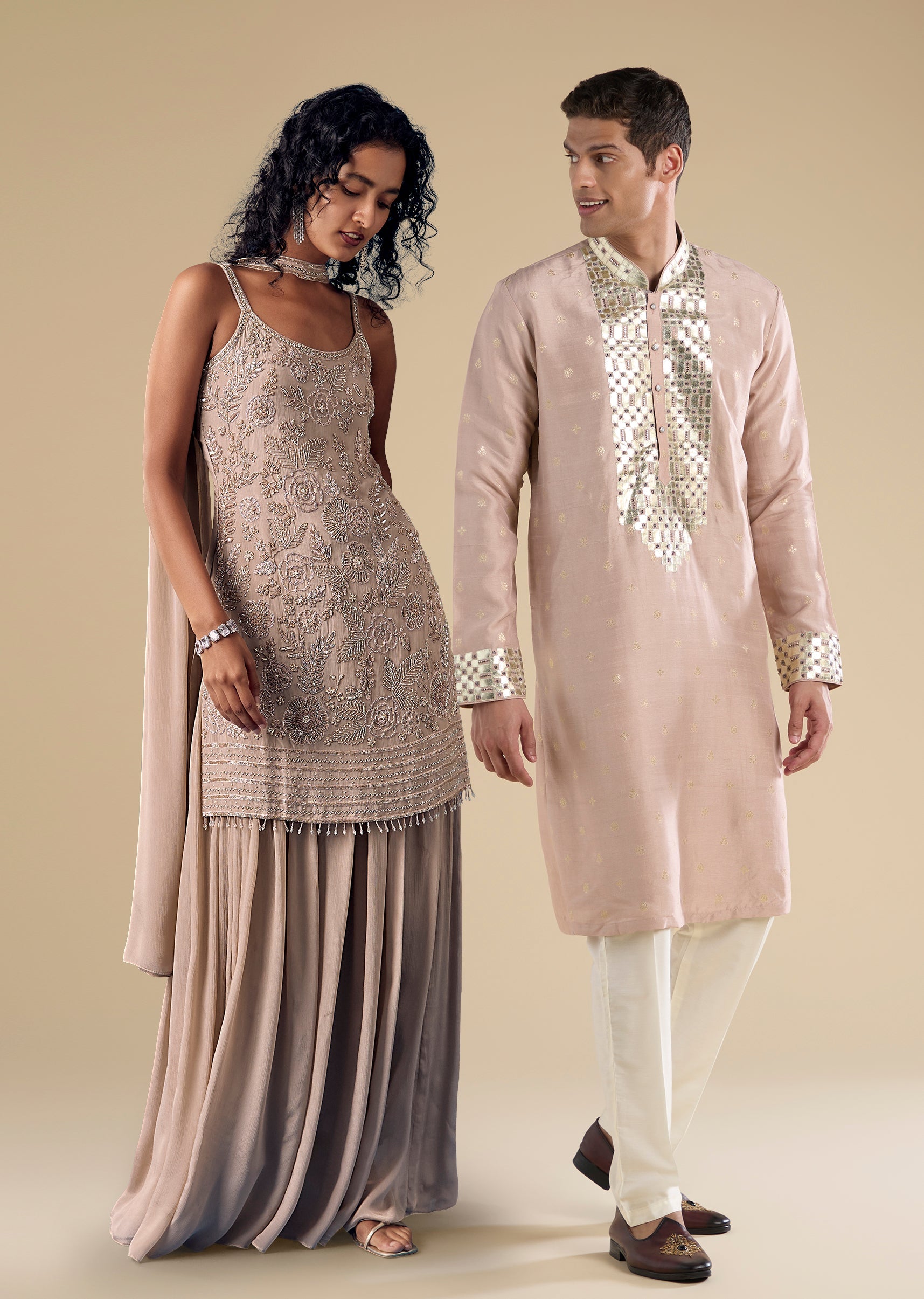 Soft Shimmer Pastel Couple Set – Beige Sequinned Sleeveless Kurta Palazzo Set with Dupatta for Her And Lilac Embellished Rawsilk Kurta Set for Him