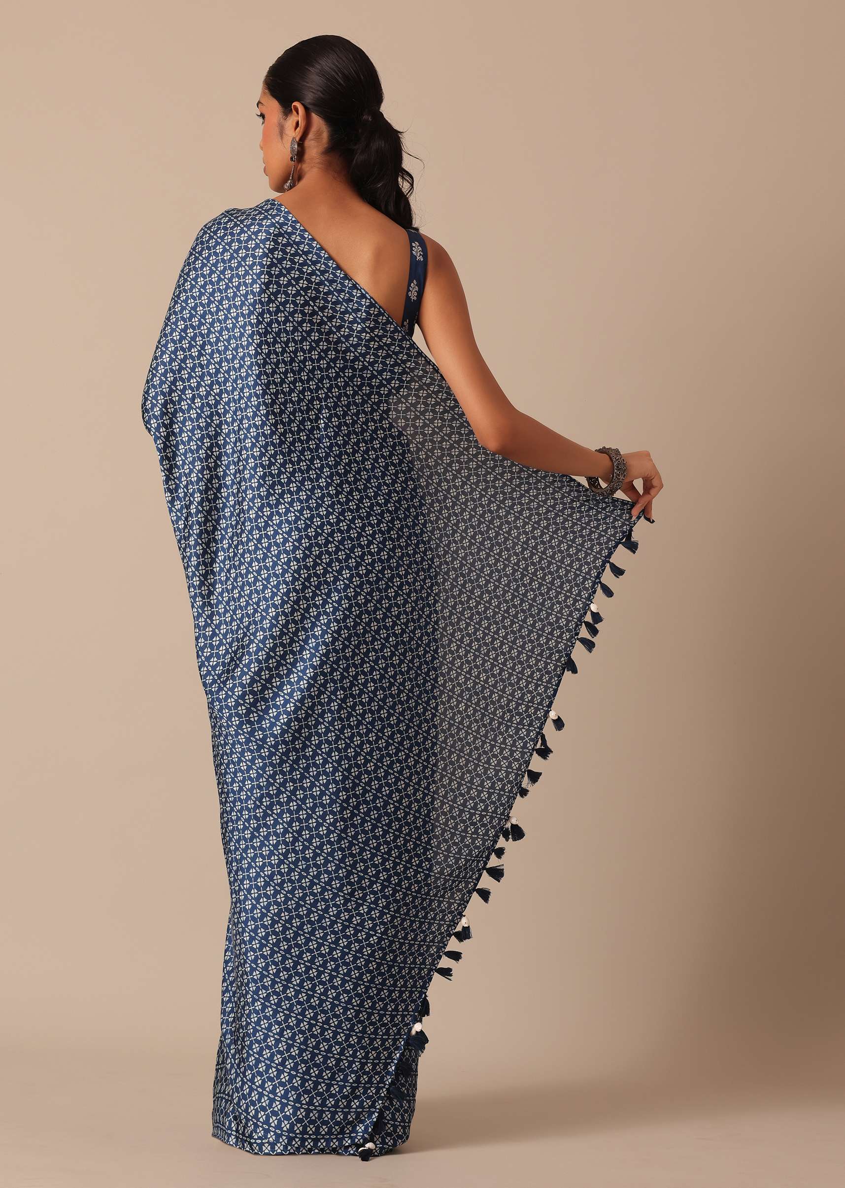 Blue Printed Saree In Satin With Tassel Pallu And Unstitched Blouse Piece