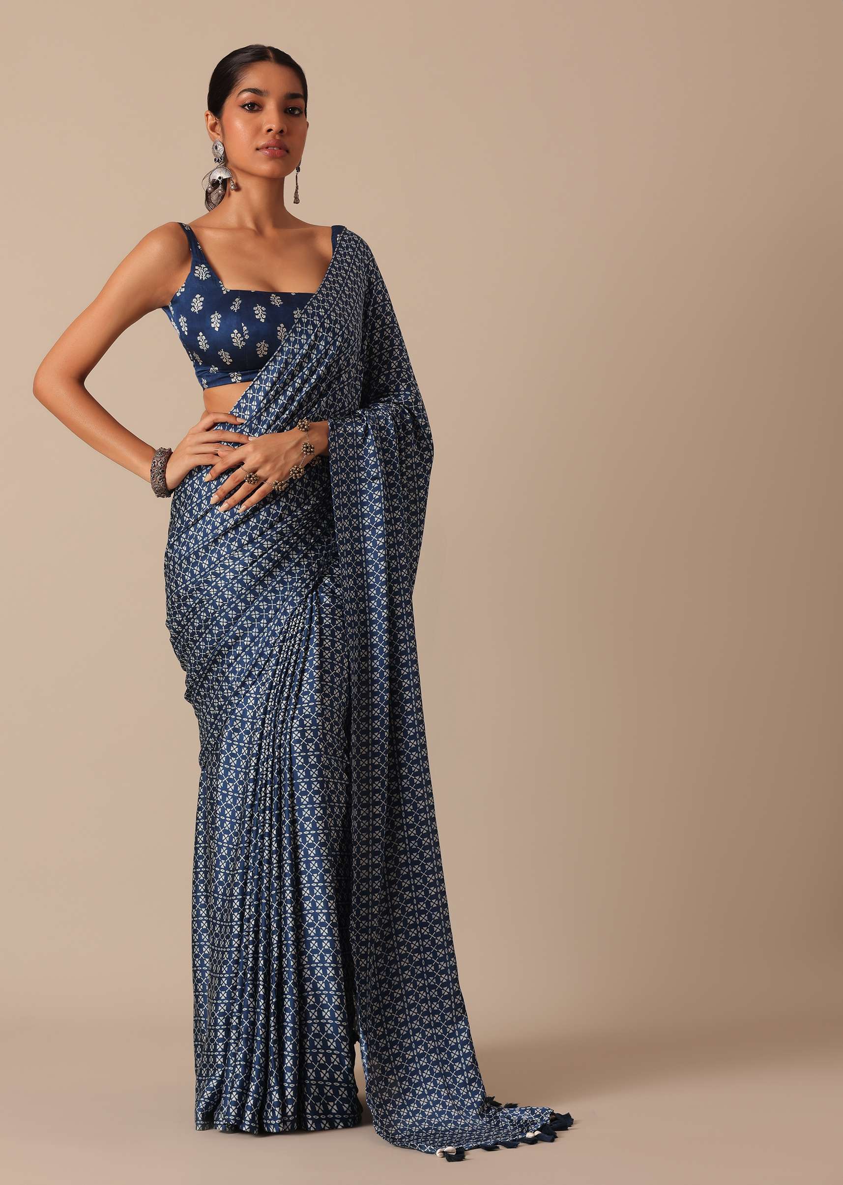 Blue Printed Saree In Satin With Tassel Pallu And Unstitched Blouse Piece