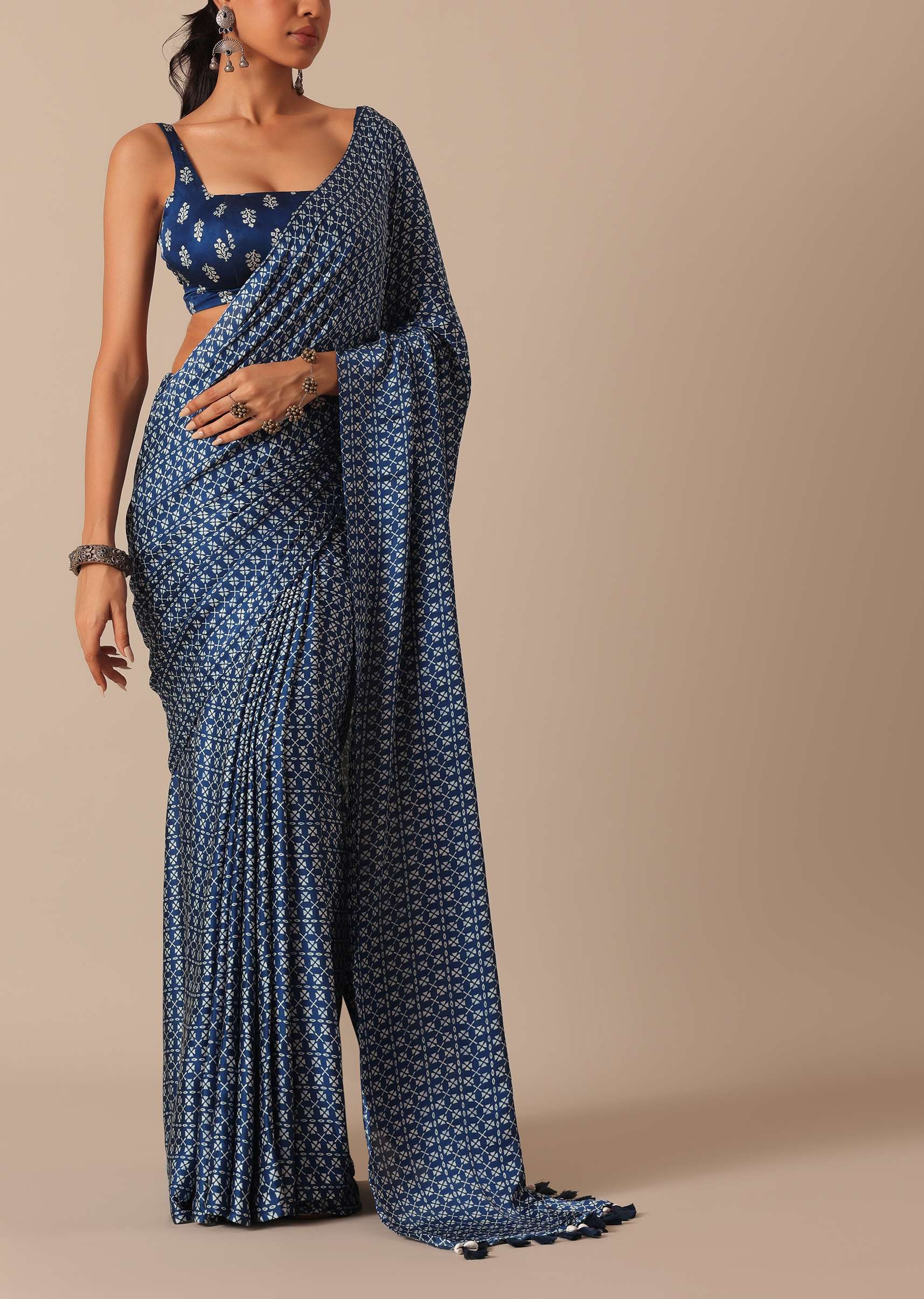 Blue Printed Saree In Satin With Tassel Pallu And Unstitched Blouse Piece