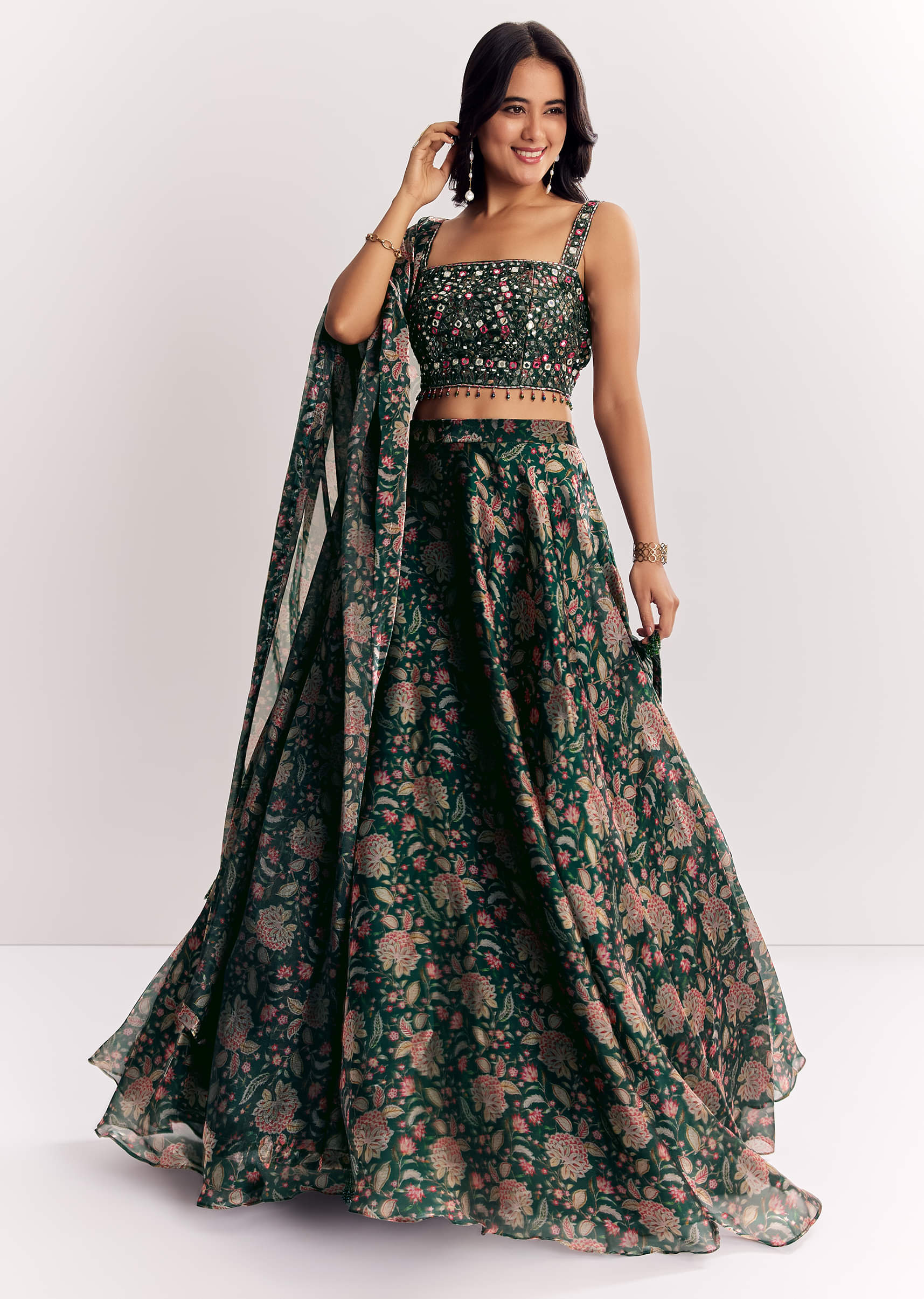 Bottle Green Mirror Work Lehenga Choli Set In Organza Tissue