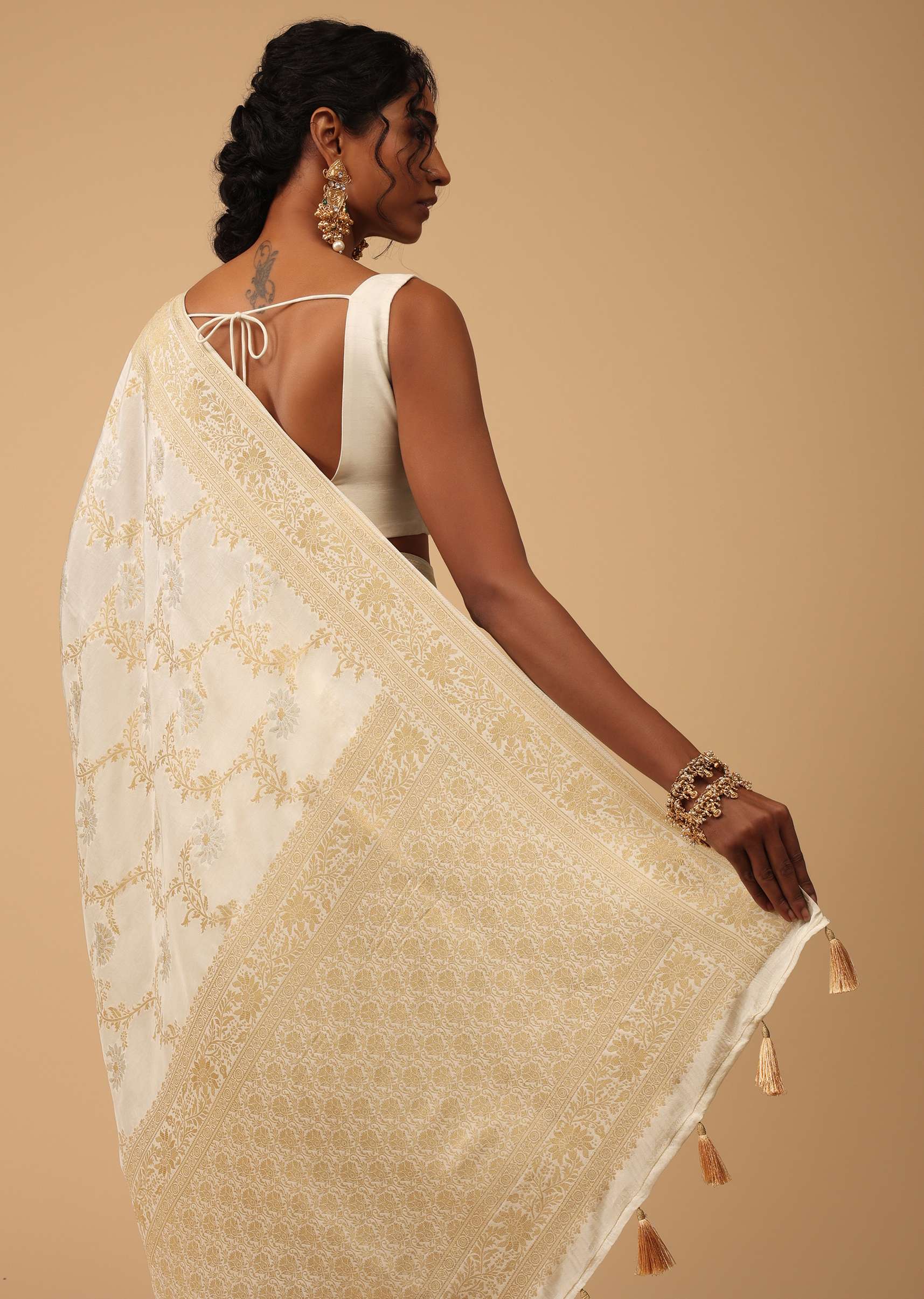 Ivory White Dola Silk Saree With Silver And Gold Jaal Embroidery In Floral Pattern