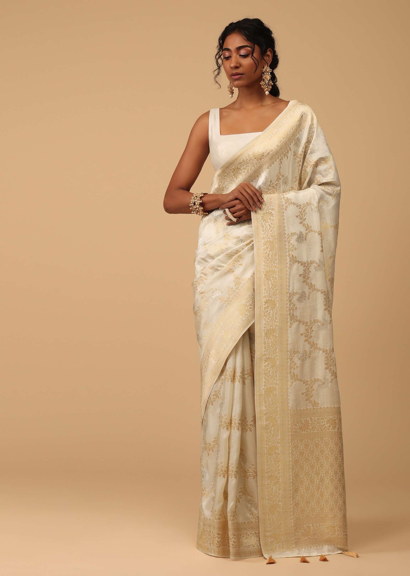 Ivory White Dola Silk Saree With Silver And Gold Jaal Embroidery In Floral Pattern
