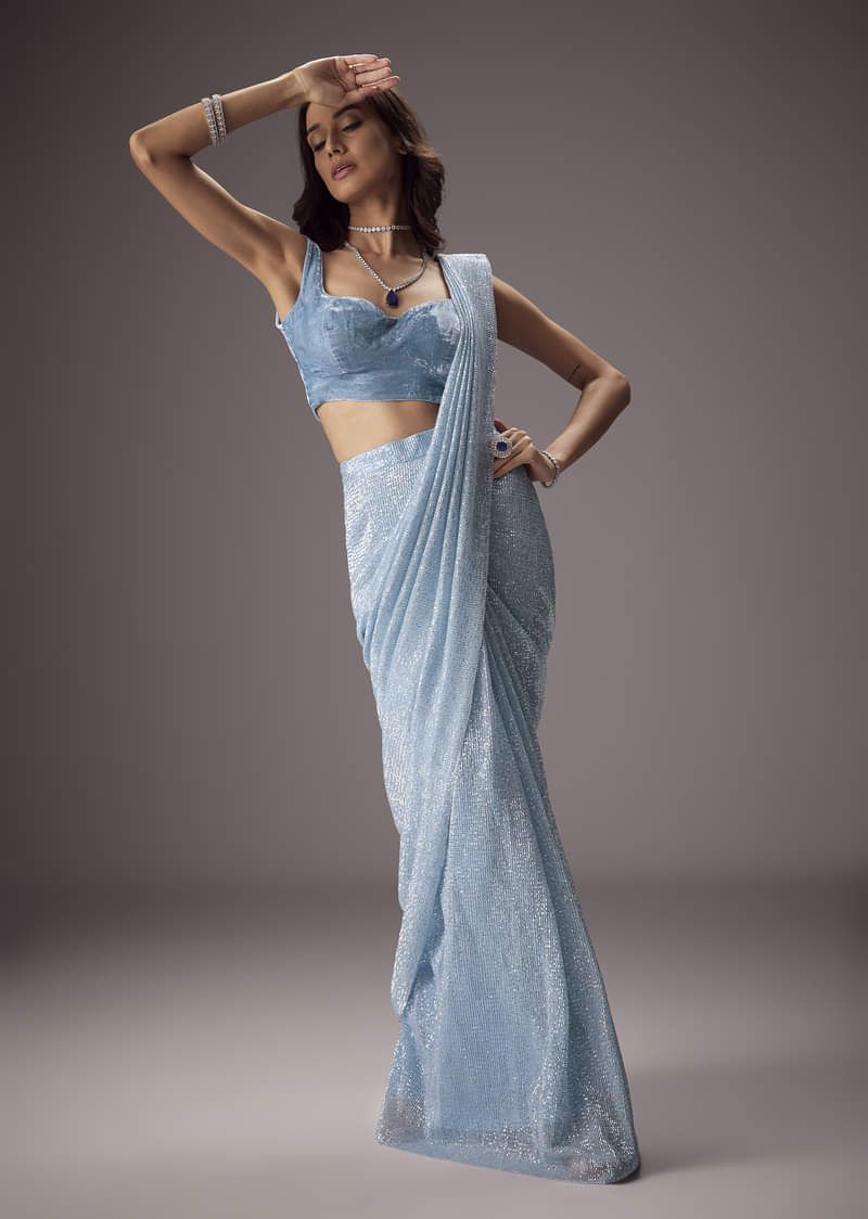 Sky Blue Shimmer Saree Paired With A Sweetheart Velvet Blouse