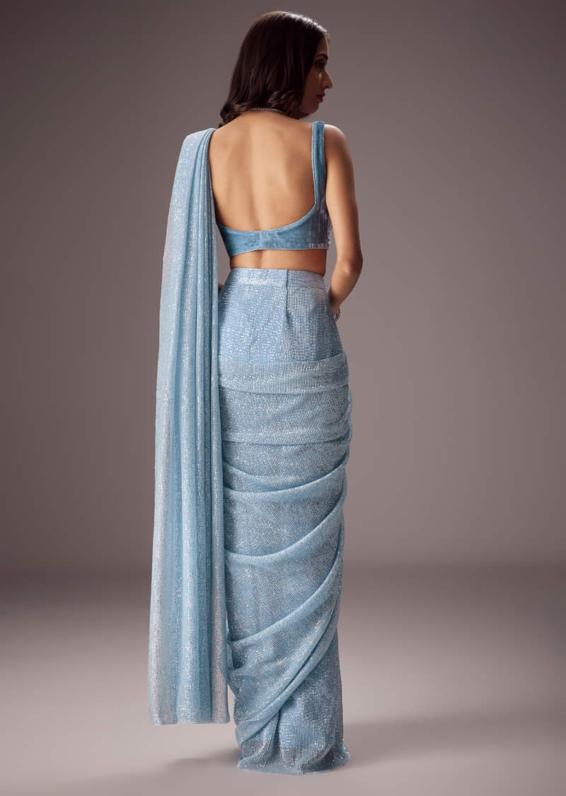 Sky Blue Shimmer Saree Paired With A Sweetheart Velvet Blouse
